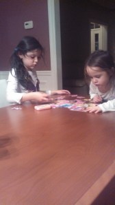 My kids working on a puzzle, leaving me alone while I cook dinner.